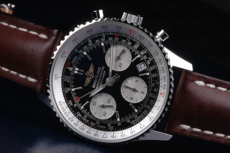 black background, indoors, strap, steel, jewelry, chronograph, luxury watches, Breitling, personal accessory, luxury, black color, time, round, fashion