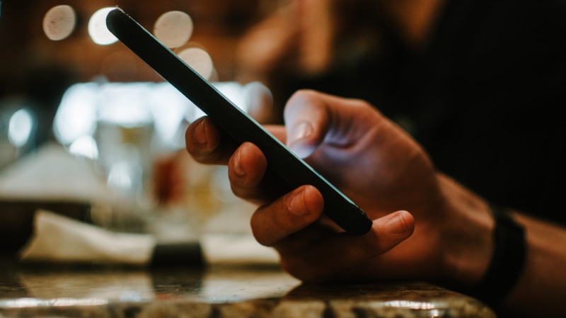 phone, luxury, weapon, pc, one person, indoors, smartphone, 5K, lcd screen, artist, close-up, person, adult, weaponry, work tool, knife, hand, screen