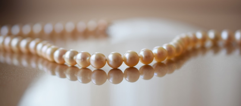 personal accessory, woman accessories, simplicity, Tenderness, pearl jewelry, shiny, beaded, closeup, copy space, luxury, pearl, 5K, indoors, elegance