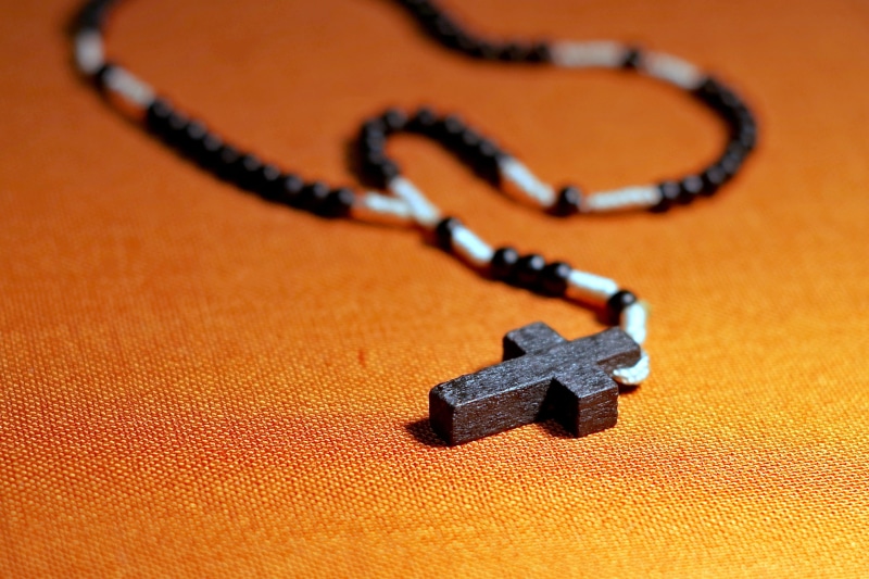 poverty, textile, high angle view, old, faith, christ, indoors, single object, prayer, beaded, jewelry, jesus, christianity, pray, wood - material, the rosary
