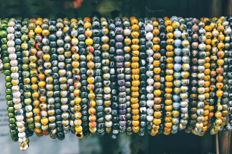 market, retail display, market stall, jewellery, beaded, day, food, retail, no people, display, lot, assorted, necklace, close-up, hanging, wellbeing, abundance