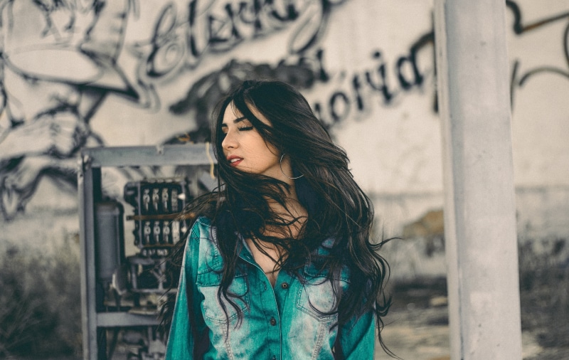 contemplation, waist up, city, architecture, one woman only, girl, machine, young women, concrete, brown hair, adult, building exterior, people, outdoors
