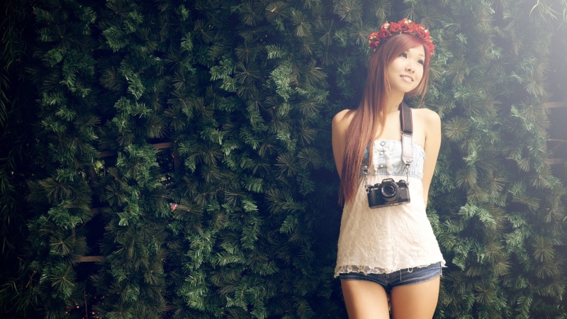 outdoors, young adult, beautiful woman, adult, long hair, three quarter length, white, fashion, redhead, leisure activity, Asian, contemplation, jean shorts