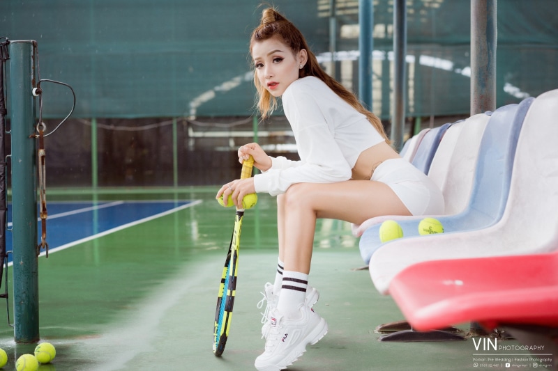 short shorts, model, socks, looking at viewer, sneakers, women, Asian, crop top, women outdoors, earring, ponytail, tennis courts, tennis balls, brunette