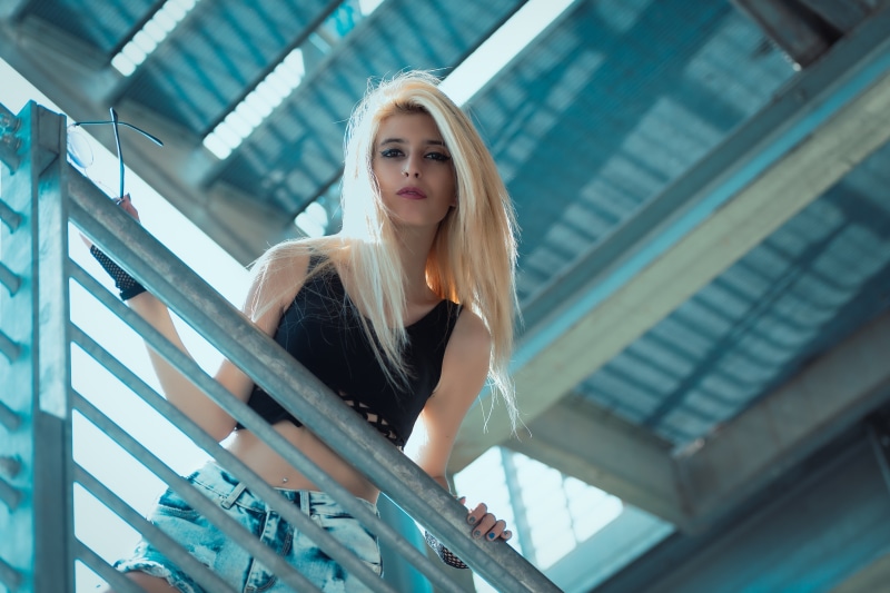 belly, pierced navel, pierced nose, blonde, outdoors, standing, looking at camera, 5K, long hair, hairstyle, hair, Luigi Malanetto, lifestyles, painted nails