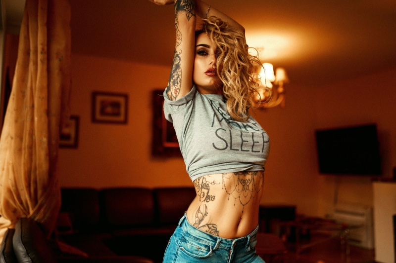 blonde, leisure activity, T-shirt, indoors, three quarter length, 1080P, home interior, one person, young adult, casual clothing, beautiful woman, women