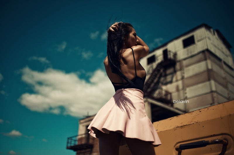 sideboob, back, hands on head, standing, skirt, cloud - sky, 2K, one person, Alexander Belavin, hairstyle, nature, lifestyles, model, black hair, fashion