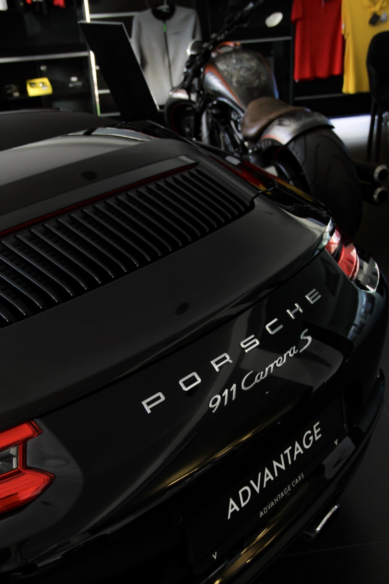 black color, retro styled, real people, western script, focus on foreground, arts culture and entertainment, porsche, carrera, s, text, close-up, music