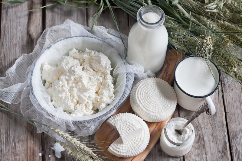 cheese, no people, container, kitchen utensil, food, bottle, healthy eating, breakfast, cottage cheese, crockery, drink, wood - material, bowl, freshness