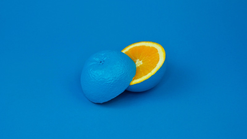 group of objects, wellbeing, healthy eating, no people, food and drink, lemon, yellow, lime, copy space, fruit, sparse, studio shot, food, freshness, blue background