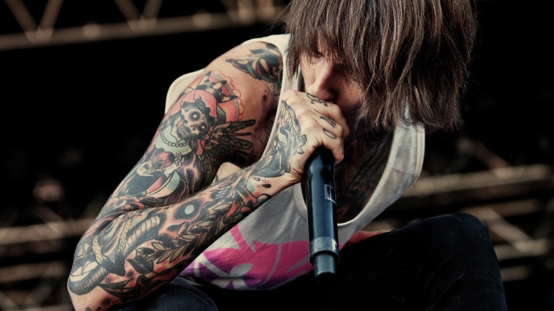 emotion, casual clothing, young adult, hairstyle, focus on foreground, individuality, couple - relationship, fashion, one person, Bring Me The Horizon