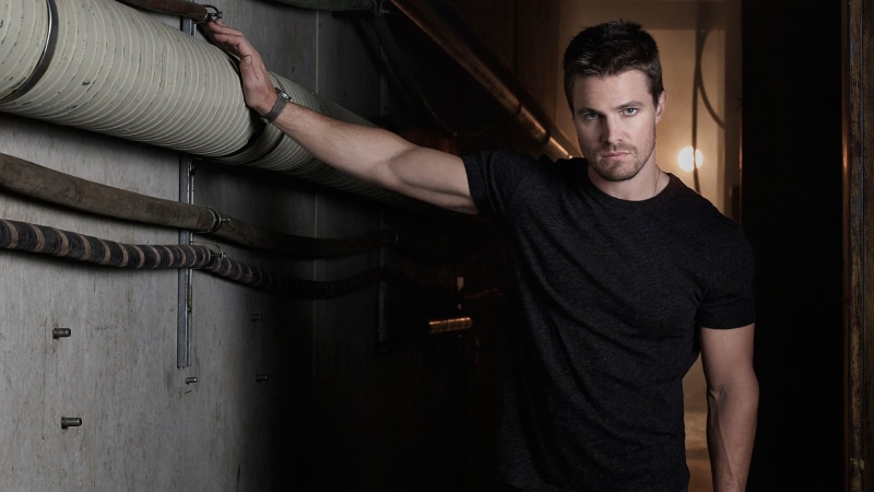 young men, dark, TV Show, men, one person, portrait, young adult, aggression, waist up, males, casual clothing, adult, facial hair, Arrow, lifestyles, beard