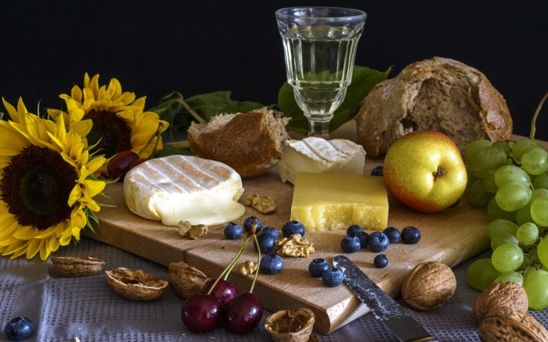 bread, freshness, berries, still life, cutting board, grapes, container, refreshment, apples, food and drink, drink, flower, cheese, breakfast, no people