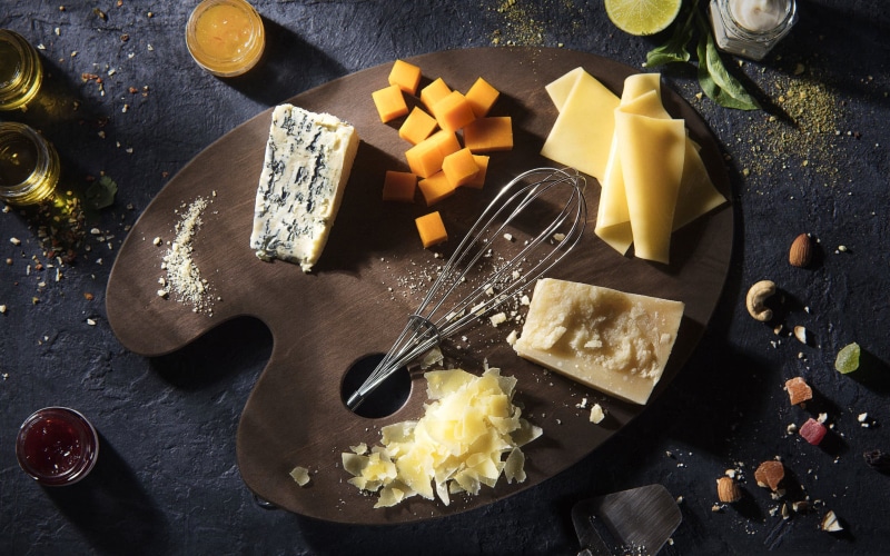italian food, freshness, food, wellbeing, preparation, cheese, dairy product, high angle view, 2K, eating utensil, fruit, cutting board, slice, Cheddar