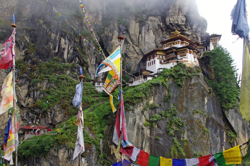 old, bhutanese, place of worship, incidental people, belief, outdoors, landmark, holy, asian, himalaya, nature, high, landscape, mountain, buddhism, culture