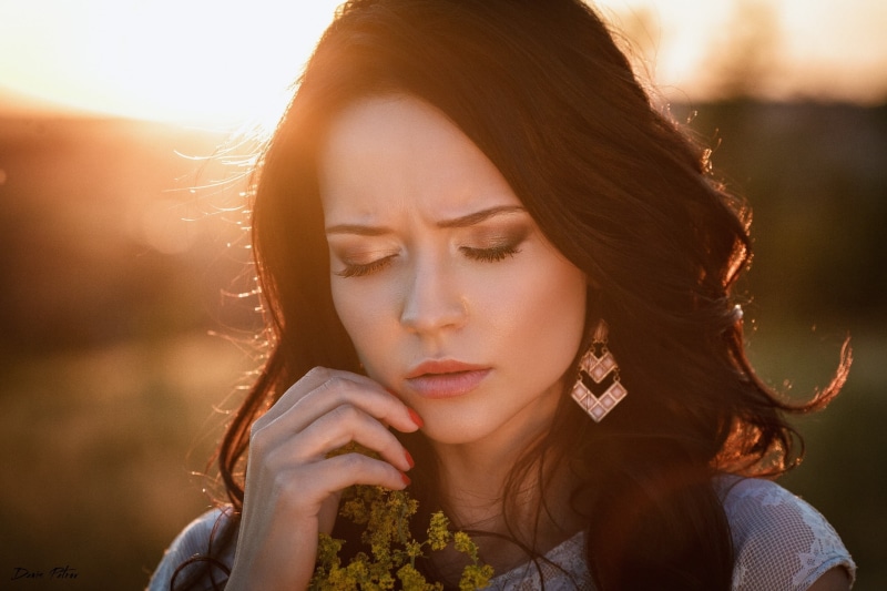 hairstyle, Denis Petrov, brown hair, looking, closed eyes, headshot, one person, lens flare, portrait, contemplation, women, 2K, sunlight, focus on foreground