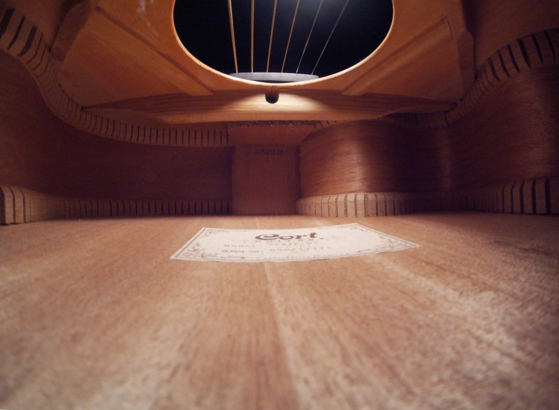 livingroom, indoors, guitar, built structure, table, 2K, inside, design, acoustic, flooring, text, day, hardwood floor, gopro, brown, no people, ceiling
