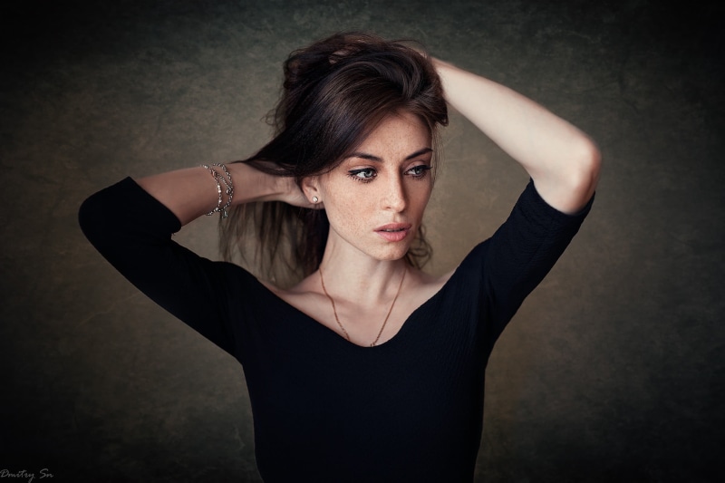 looking away, hands in hair, looking at camera, hairstyle, hands behind head, black, face, 1080P, front view, hand, v, brown hair, sleeved, blue eyes