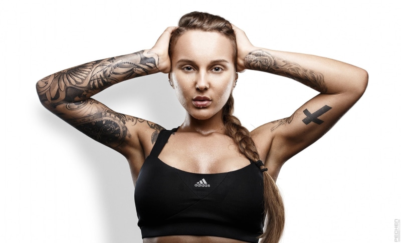 Adidas, women, looking at camera, portrait, hands on head, indoors, tanned, adult, tattoo, beautiful woman, cut out, hand in hair, white background, standing