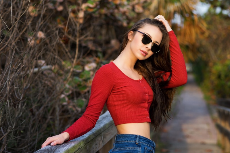red, 1080P, lifestyles, leisure activity, one person, glasses, young women, beautiful woman, young adult, jeans, outdoors, casual clothing, red sweater