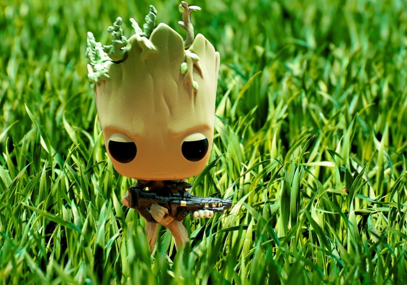 human representation, close-up, toy, tree, green color, grass, outdoors, art and craft, film, focus on foreground, no people, nature, model, representation