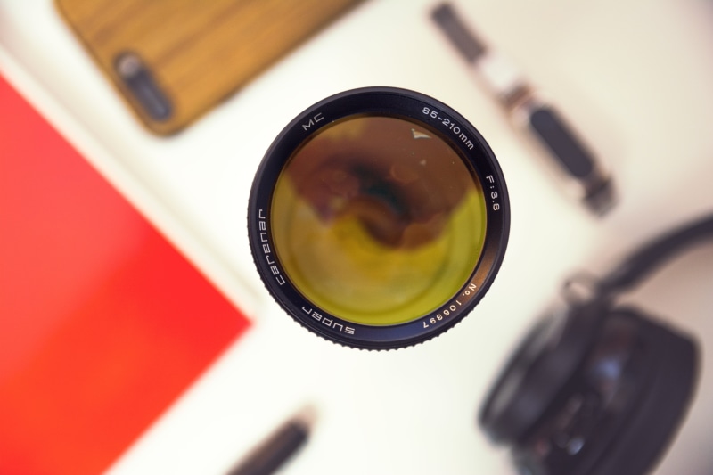 rho, table, old, 35mm, selective focus, close-up, photographic equipment, food and drink, lens, focus on foreground, lens - optical instrument, digital camera