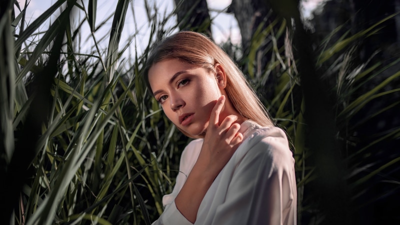 blouses, women outdoors, model, touching face, plants, face, looking at viewer, brunette, Ksenia Kokoreva, women, Yuriy Lyamin, bokeh, 2K, outdoors