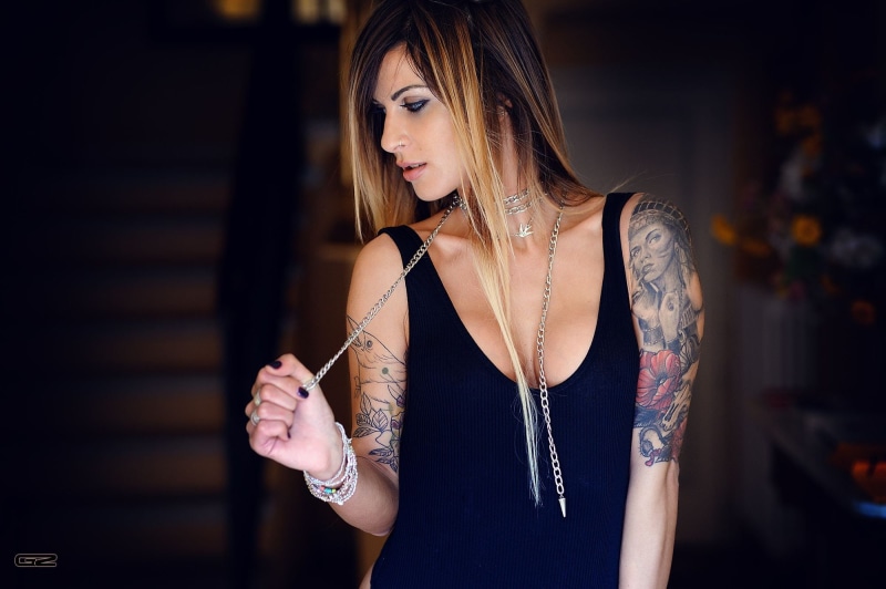 straight hair, black clothing, rings, long hair, earring, bracelets, pierced nose, eyeliner, make up, piercing, black nails, tattoo, women, chains, painted nails