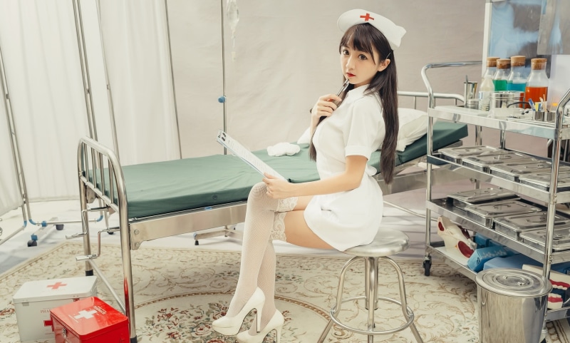 beautiful woman, nurse outfit, leisure activity, women, adult, childhood, 1080P, young adult, side view, chair, seat, real people, model, lifestyles, indoors