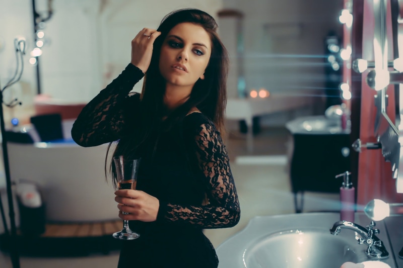 adult, looking at camera, hairstyle, top, real people, long, model, lifestyles, one person, young adult, portrait, mirror, beauty, indoors, dress, fashion