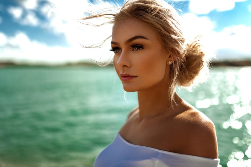 portrait, outdoors, sea, beauty, young adult, beautiful woman, 1080P, women outdoors, women, blonde, hair, focus on foreground, sky, fashion, hairstyle