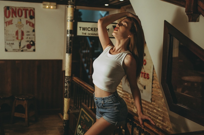 young adult, lifestyles, one person, strength, healthy lifestyle, jean shorts, side view, clothing, text, mirror, arms up, model, white tops, beautiful woman