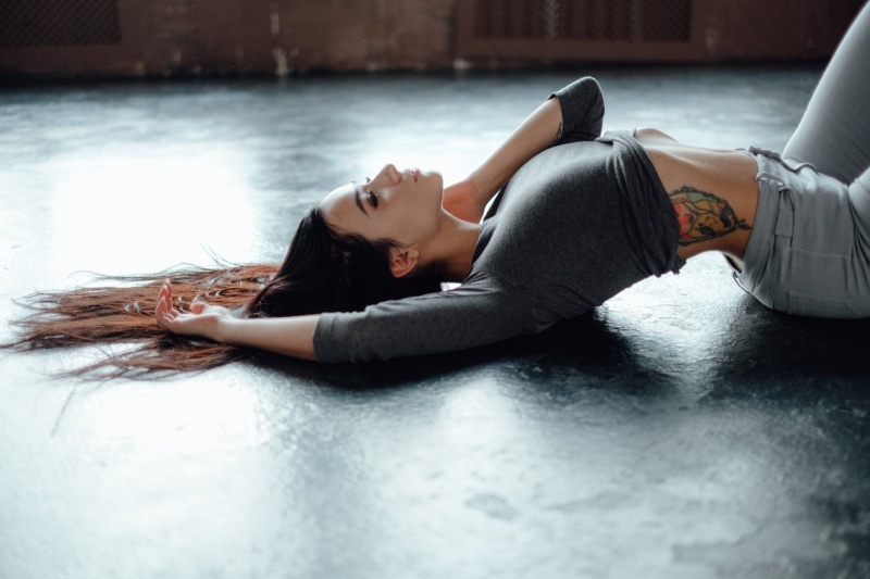 profile, women, inked girls, tattoo, brunette, grey tops, depth of field, long hair, arched back, model, 2K, side view, women indoors, Aleksa Tereschuk