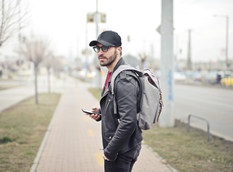 male, young, smartphone, sound, work, style, Walking, three quarter length, standing, focus on foreground, outdoors, adult, holding, wireless technology