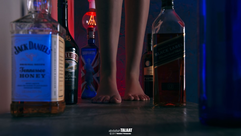 drink, illuminated, human body part, nightlife, one person, Johnnie Walker, indoors, human foot, real people, food and drink, Jack Daniels, transparent