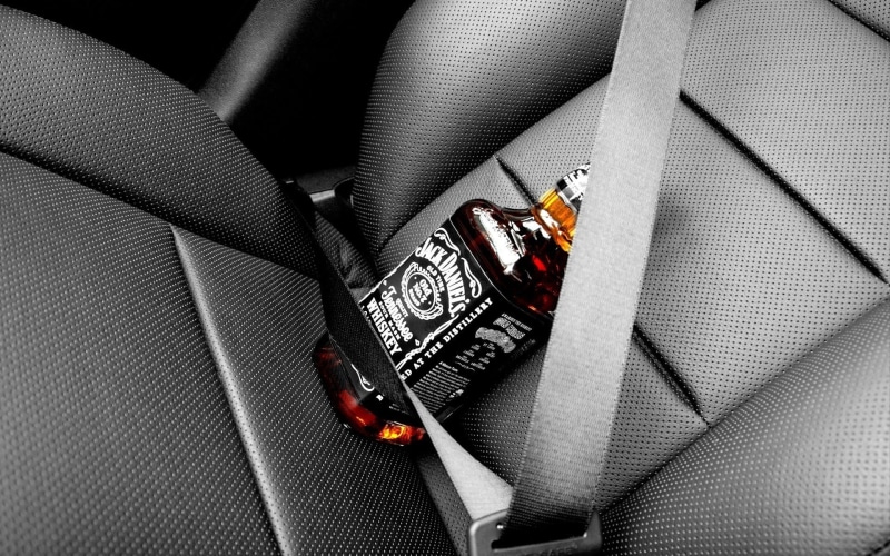 whisky, still life, car interior, pattern, midsection, whiskey, close-up, alcohol, real people, Jack Daniels, representation, jewelry, fashion, daniel