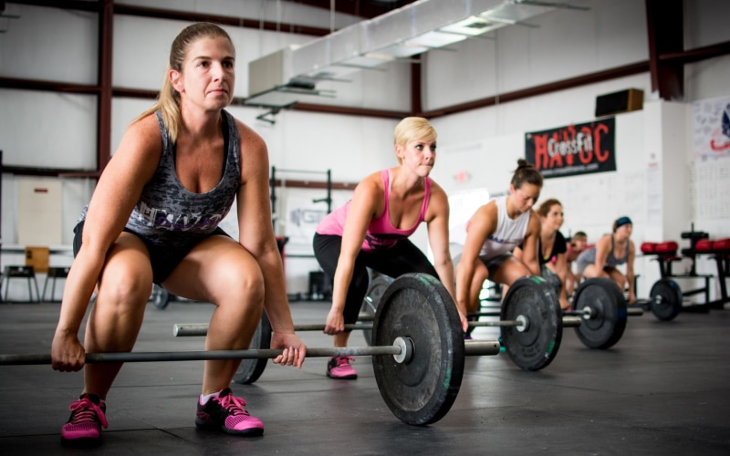vitality, self improvement, physical activity, weights, exercise equipment, cross training, determination, equipment, sports, weight, women, clothing, exercising