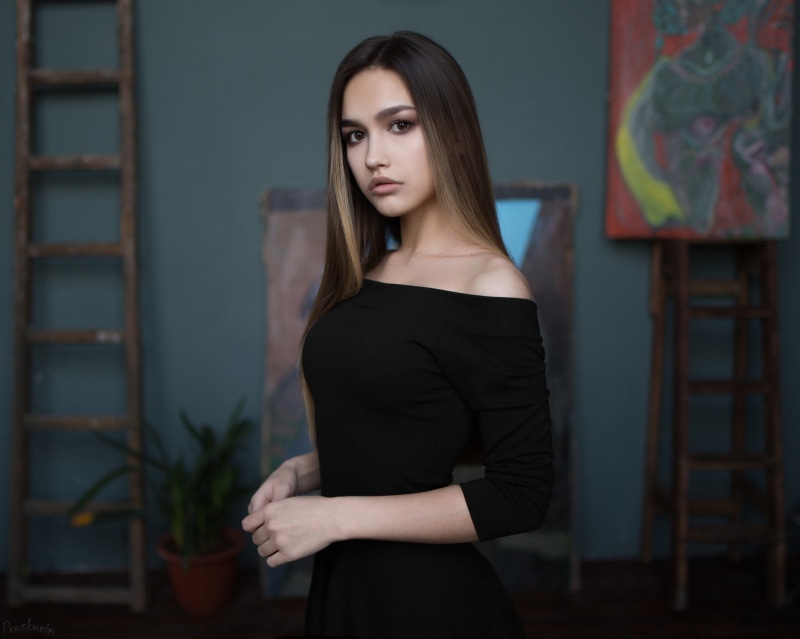 black color, fashion, beauty, portrait, real people, straight hair, juicy lips, ladders, focus on foreground, beautiful woman, standing, looking at camera