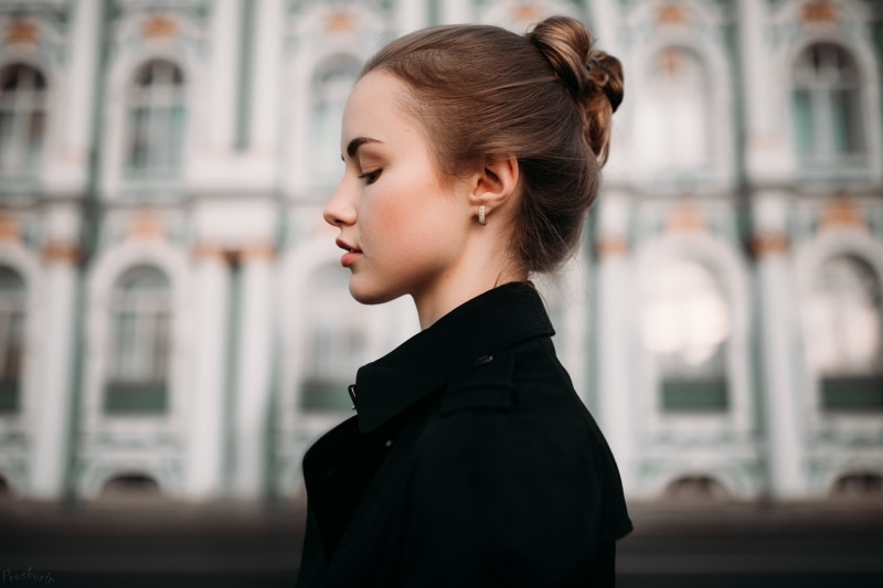 outdoors, headshot, day, Julia Tavrina, teenager, black coat, one person, city, side view, Ivan Proskurin, lifestyles, architecture, model, built structure