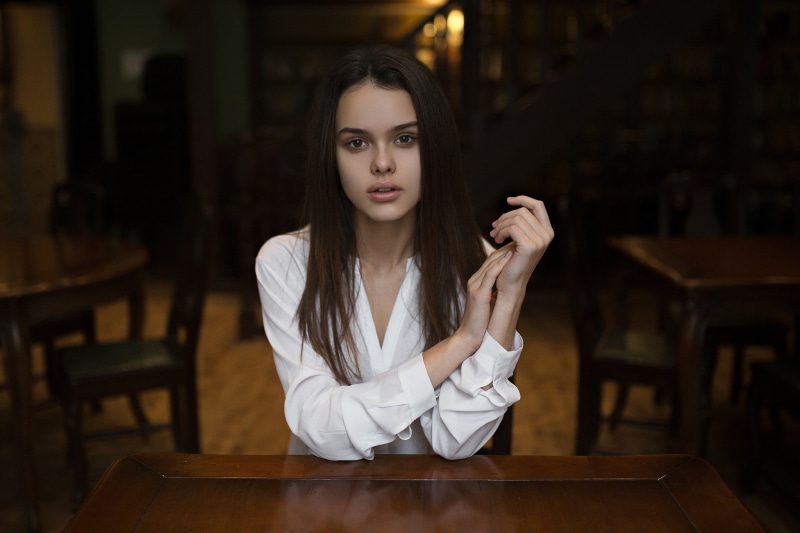waist up, shirt, looking at camera, young women, face, 1080P, hairstyle, beauty, indoors, Ivan Proskurin, table, beautiful woman, young adult, hair, one person