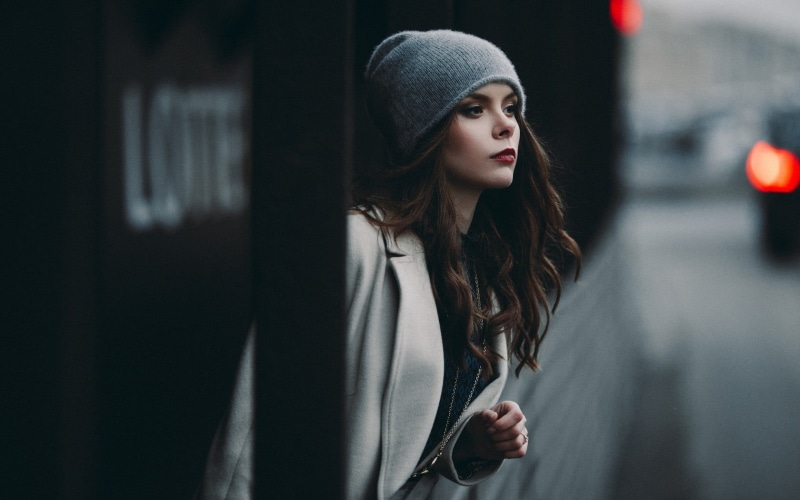 model, fashion, clothing, hairstyle, looking away, women, city, 720P, hat, coats, real people, makeup, standing, white coat, casual clothing, depth of field