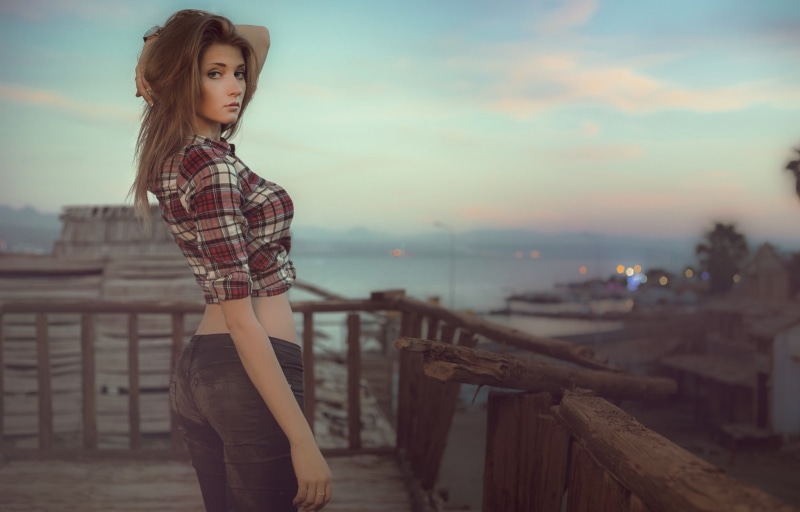 outdoors, one person, women outdoors, portrait, standing, sky, beautiful woman, hands on head, black, young women, casual clothing, s, looking over shoulder