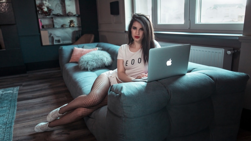 sitting, technology, Anna Wolf, couch, indoors, home interior, jean shorts, beautiful woman, hairstyle, women, sofa, computer, cat ears, furniture, T-shirt