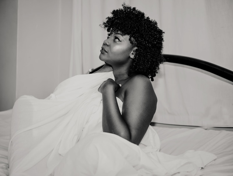 young adult, black and white, photoshoot, one person, minimalism, curly hair, contemplation, hair, frizzy, fashion, woman, beautiful woman, women, bed