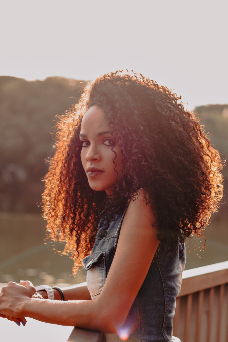 elegant, one person, photography, women, attractive, close-up, hair, focus on foreground, woman, wooden, porch, nature, standing, young adult, outdoors