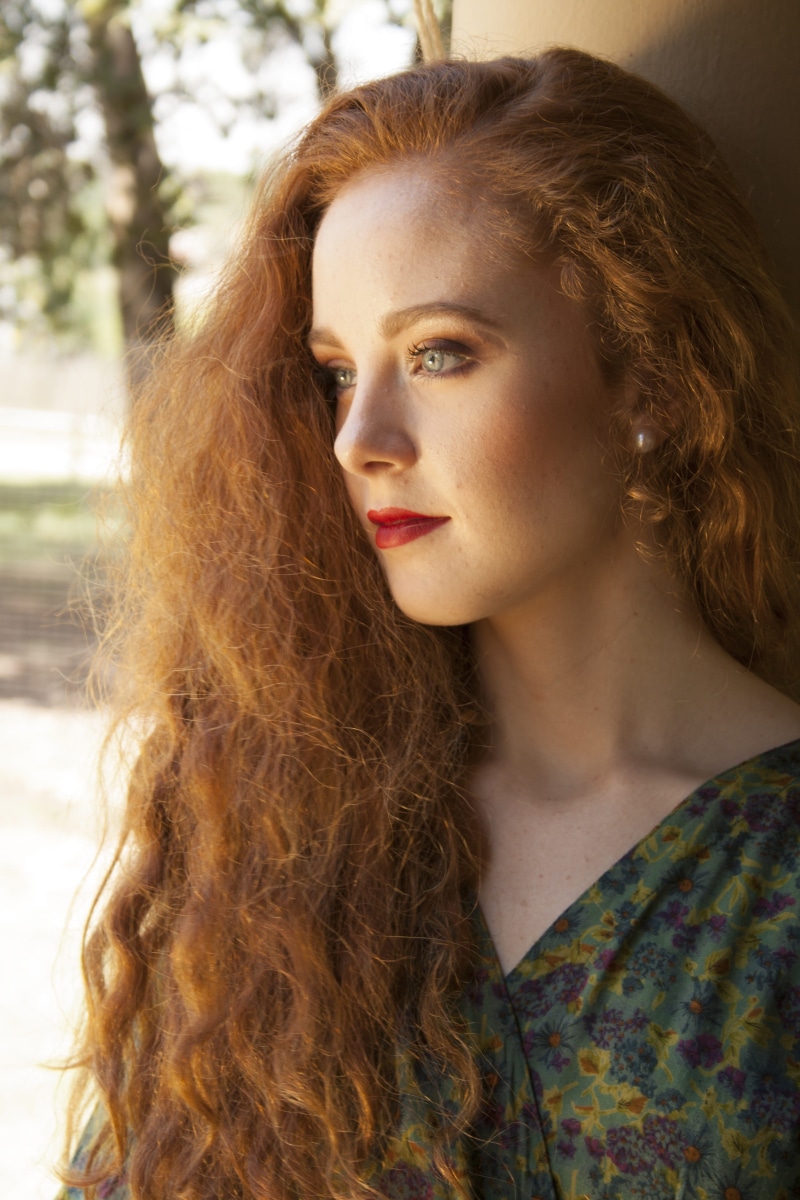 front view, red hair, frizzy, floral, focus, brunette, adult, looking at camera, women, brown hair, 4K, redhead, beauty, long hair, contemplation, curly hair