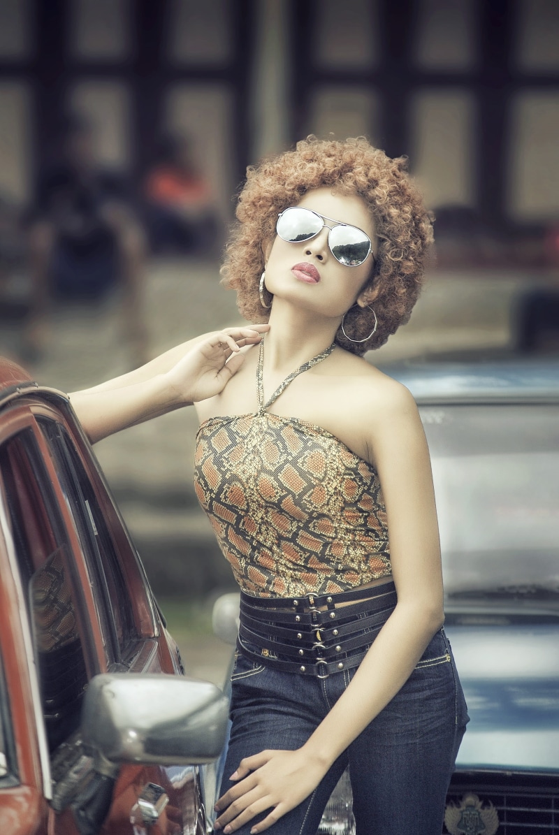 model, blue, brown, 4K, three quarter length, hair, black, focus on foreground, car, curly hair, near, young women, luxury, beauty, vehicle, hairstyle