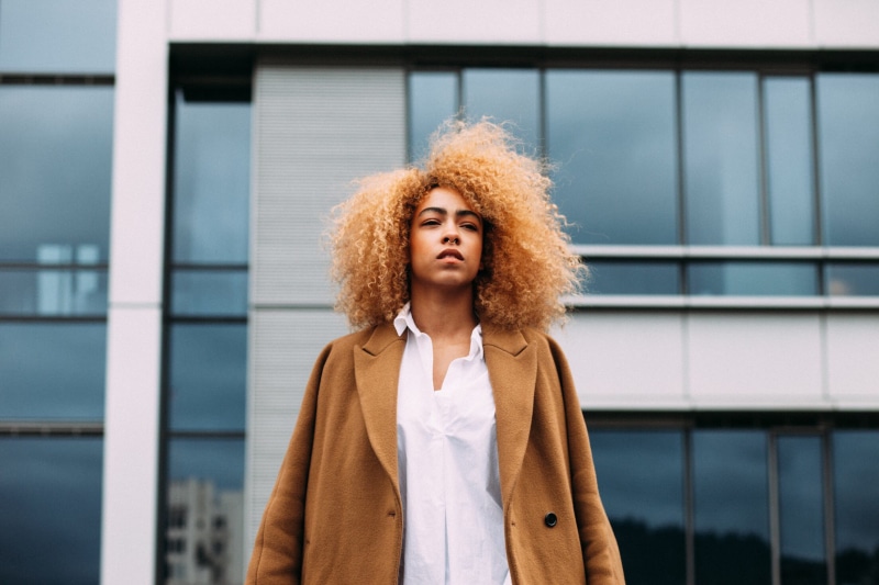 frizzy, city, brown, beautiful people, front view, casual clothing, contemplation, female, outdoors, coat, portrait, front, beauty, beautiful woman, hair