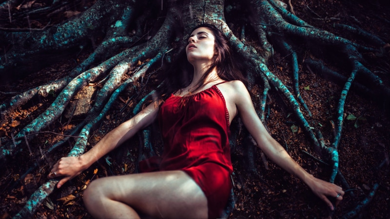 fashion, adult, lying down, long hair, trees, 1080P, photography, women outdoors, dark, front view, roots, red dress, Gustavo Terzaghi, legs, model, three quarter length