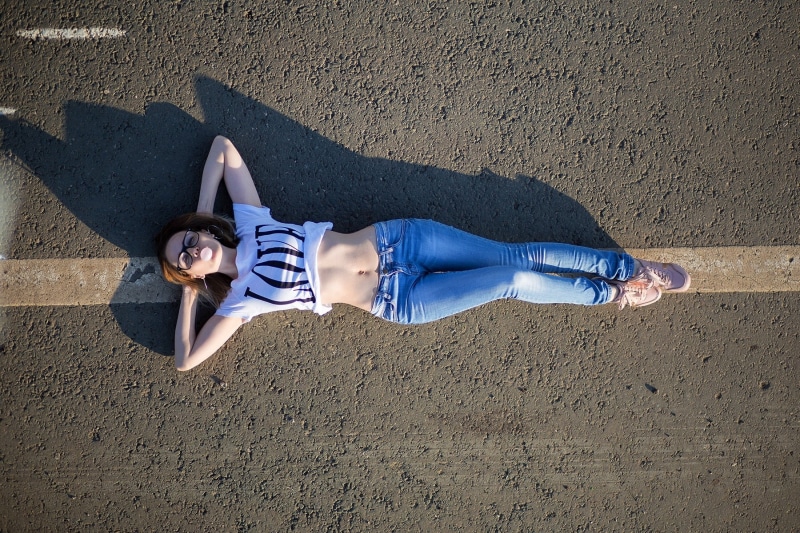 bubble gum, sneakers, on the floor, road, T-shirt, lying on back, blonde, jeans, Aleksey Lozgachev, top view, belly, women with glasses, outdoors, women outdoors